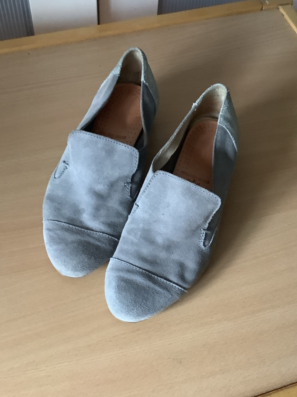 Light Gray Suede Slip-On Loafers with Metallic Heel Accent